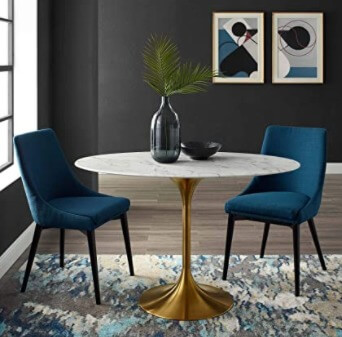 7 Mid Century Modern Round Table & tips
2. Mid-Century Modern Dining Table for 4 persons. There is also a way to give a point with blue when decorating a mid-century interior. Decorating the dining table with blue chairs will give your home a calming mood. 