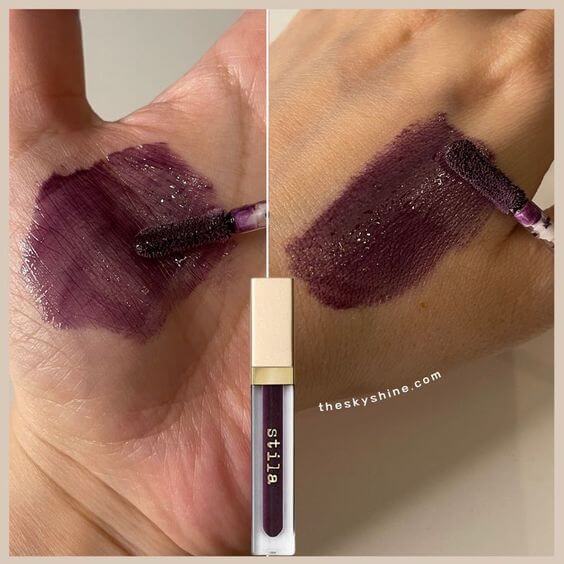 Stila Beauty Boss Lip Gloss Bonus Baby Review 1. Color Stila Bonus Baby is dark purple and has a glossy finish. It's moist and soft, and it instantly creates volume on lips immediately. 