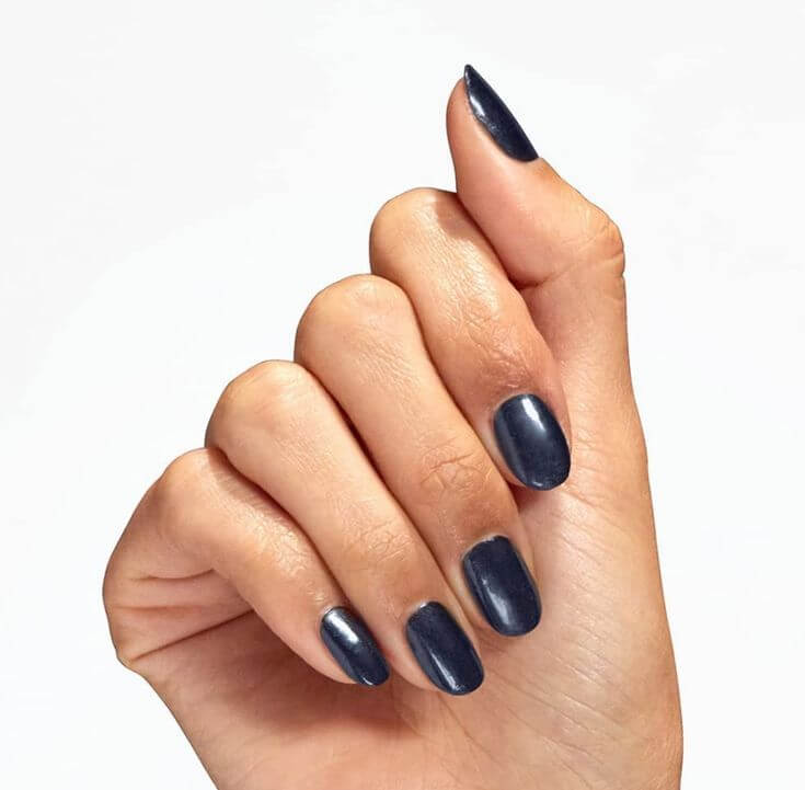 Dark Blue: The Must-Have Nail Polish for Every Season 1. OPI Nail Lacquer in Midnight Mantra With a touch of green in its midnight color, this deep blue manicure can add a refined sophistication.
OPI Nail Lacquer Midnight Mantra