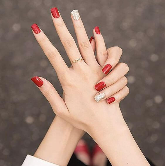The 10 Best Red Press-On Nails Short Red Press-On Short Nails KISS imPRESS"TWEETHEART" is vibrant, and silver glitter can make it look more colorful. 