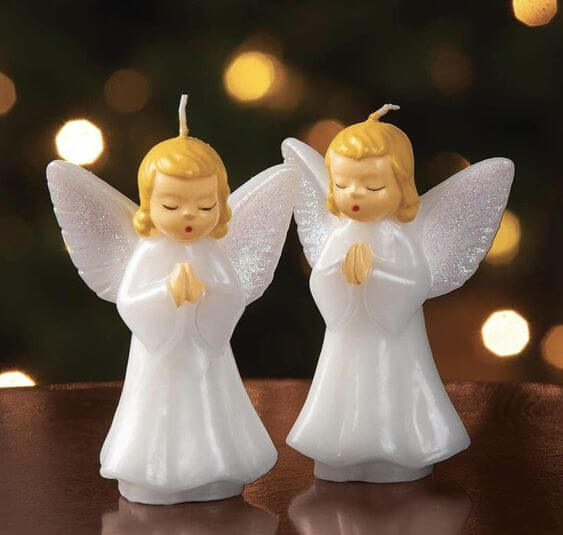 10 Best Decorative Christmas Candles 1. Vintage Style Angel & Caroler Candles Praying Angel Candles is popular in the 1950’. These remind happy memories. 