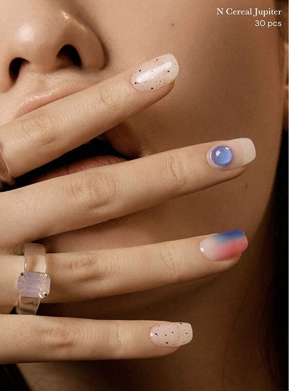 11 Blue Short Nail Designs: Fake Nails & Nail Strips 2. Gel Nail Strips Nude and blue nails Nude and blue nails This simple nude nail design and transparent blue nails create a modern yet youthful look. These nails will be perfect for people who like modern design.
