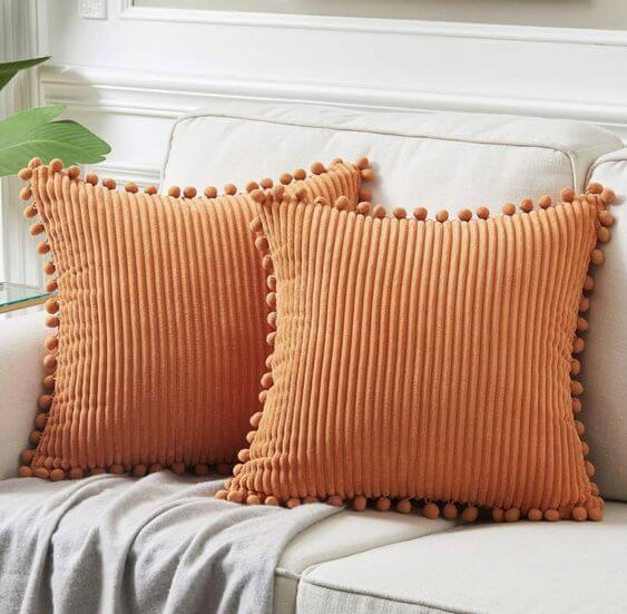 The 5 Best Halloween Throw Pillow Covers, Classic Orange
Fancy Homi Burnt Orange Throw Pillow Covers 
This classic orange color and cute Pom poms design are timeless and perfect for creating a cozy Halloween atmosphere in homes with family, friends, and young children