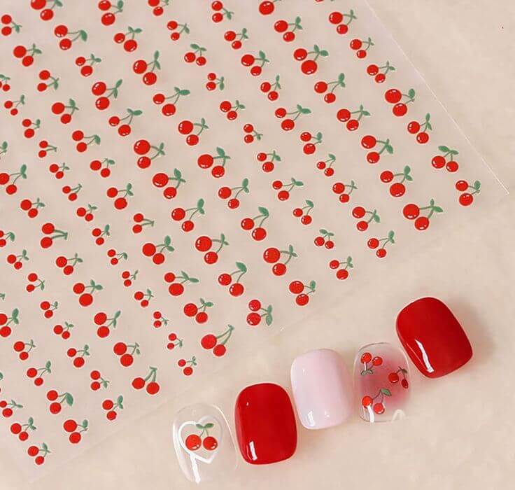 Cherry Bliss for Your Toes: The 3 Best Cherry Ohora Gel Pedicure Strips Get the look: Cherry Nail Art Stickers: If you want to capture more cherries, you can also add cherry nail art stickers. After using these nail art stickers, if you want to keep it for more than 2 weeks, you can cure it again using a gel UV light.
OCOUYVD Fruit Cherry Nail Art Stickers 