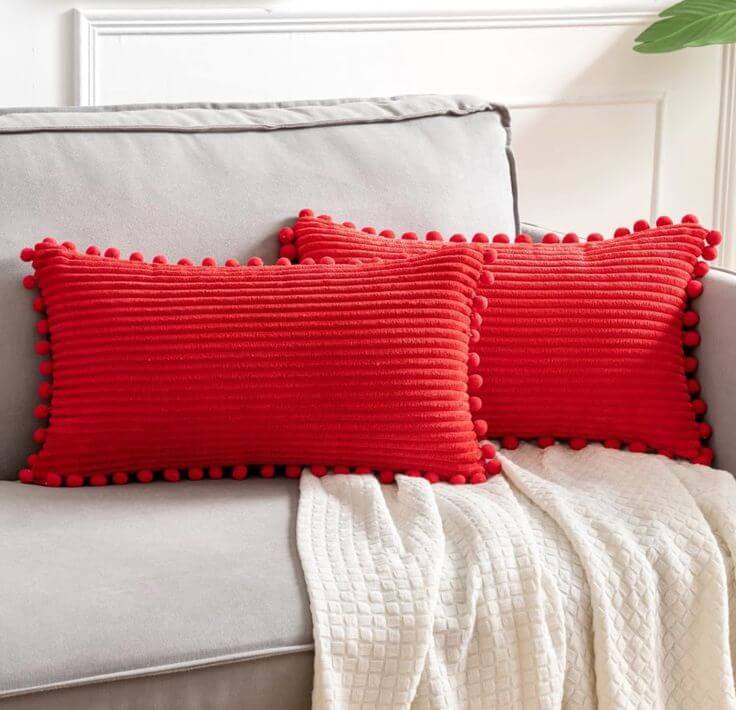 Top 5 Christmas Red & White Decor Pillow Covers to Brighten Your Home 1. Versatile Holiday Decor with Pom-Poms Add a touch of pom-pom perfection to your space with this cute and lovely pillow cover. This cover showcases a blend of vibrant red with a nice, soft, and velvety texture, creating a modern and stylish holiday look. 
MIULEE Christmas Boho Decorative Throw Pillow Covers with Pom-poms,