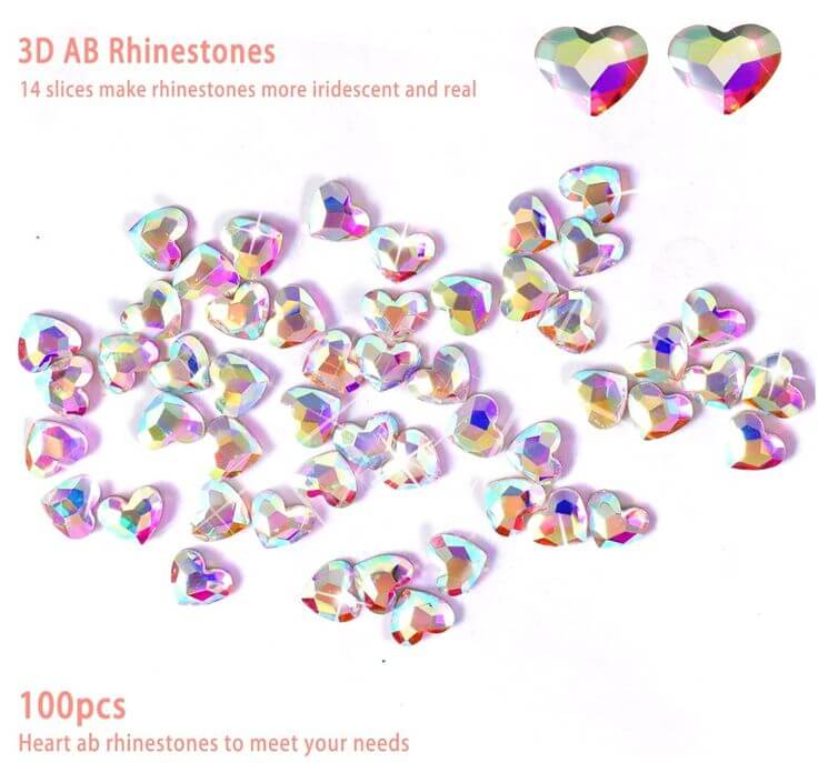 Heart to Heart: 5 Stunning Nail Rhinestone for a Romantic Look 5. Rainbow Heart Rhinestones For those who love a splash of various colors, rainbow heart rhinestones are the perfect choice. 
Allstarry 100pcs Flatback Rhinestones Heart-Shaped Irridescent Face Gems Eye Gemstones Nail Charms for Crafts AB Glass Crystals for Jewelry Making, Eye Makeup- 6mm