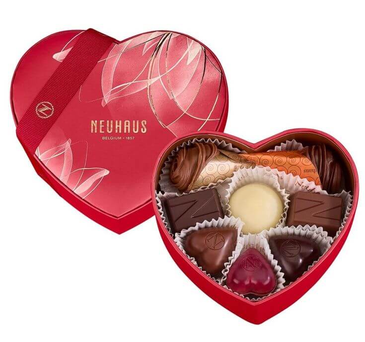 The Sweet Treats: Top 3 Neuhaus Chocolate for Valentine's Day 2. Valentine Small Heart Box This is an adorably heart-shaped box filled with a selection of heart-shaped pralines. 
Neuhaus Belgian Chocolate 2024 Valentine Chocolate Heart Small – 16 Pieces Assorted Milk, White & Dark Chocolate Pralines – Romantic Gift - Gourmet Chocolate Gift