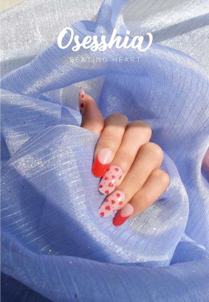 Top 6 Red Heart Gel Nail Strips for a Romantic Look 2. Beating Heart
Osesshia Semi Cured Gel Nail This design features small red hearts scattered on a pinkish nude base, creating a lovely and romantic effect. 
Osesshia Semi Cured Gel Nail Strips, 20 pcs Nail Wraps Color: Beating Heart