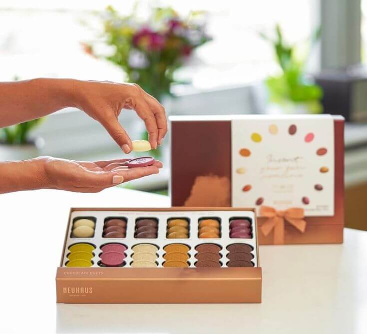 Neuhaus’ Best 5 Gift Boxes for Chocolate Aficionados 5. CHOCOLATE DUETS SLIDER BOX This offers a customized, exclusive personal tasting experience, combining creativity and tradition in every bite. 
Neuhaus Belgian Chocolate Duets Slider Box – 36 Chocolates to Mix & Match – 36 Flavor Combinations – Personalized Experience – Invent Your Own Praline