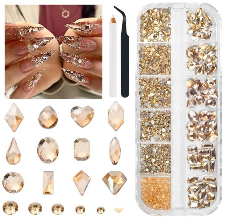 Heart to Heart: 5 Stunning Nail Rhinestone for a Romantic Look 2. Champagne Gold Heart Rhinestones Soft and subtle, these champagne gold heart rhinestones offer a more understated elegance in complex nail art. 
qiipii 1300-Piece Nail Art Rhinestone Kit - 60 Shapes in Champagne Gold with Tweezers and Wax Pen